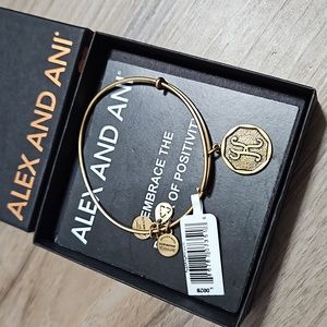 Alex and Ani charm bracelet with "K" initial gold color